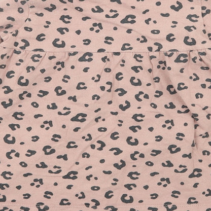 Brand and care label for F&F girls’ pink animal print jersey t-shirt dress, size 3-6, months