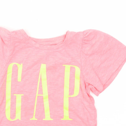 Close-up detail of Gap girls’ pink basic t-shirt, size M