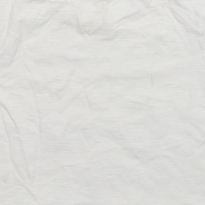 Brand and care label for F&F girls’ white basic t-shirt, size 9-10, years