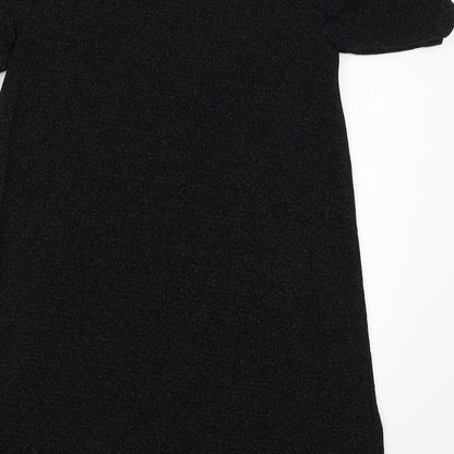 Brand and care label for Next girls’ black basic blouse, size 10, years