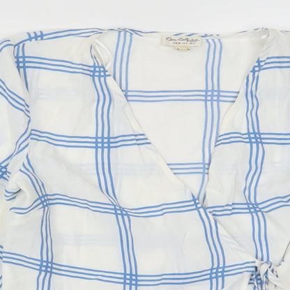 Close-up detail of Miss Selfridge women’s white check wrap blouse, size UK 6, - blue