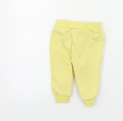 Back view of Primark boys’ yellow sweatpants, size 6-9, months