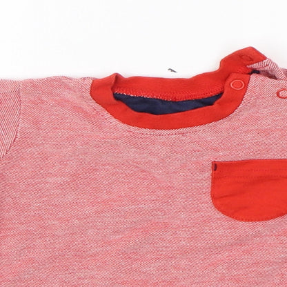 Close-up detail of George girls’ pink basic polo, size 3-6, months