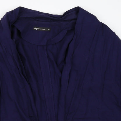 Close-up detail of Internationale women’s blue jacket, size UK 16