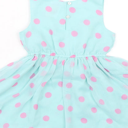 Brand and care label for E-vie Angel girls’ blue polka dot tank dress, size 2, years