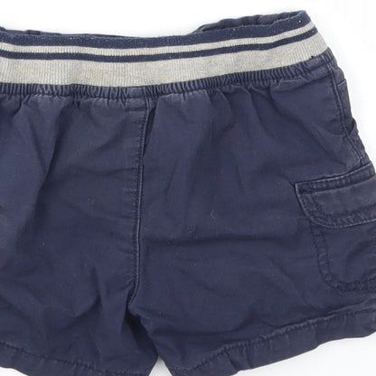 Brand and care label for Matalan boys’ blue capri jeans, size 12-18, months