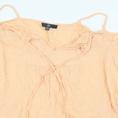 Close-up detail of Missguided women’s pink tunic blouse, size UK 10