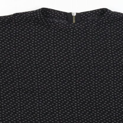 Close-up detail of Atmosphere women’s black basic blouse, size UK 14