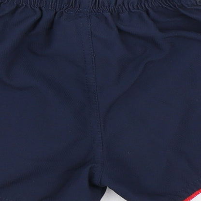 Brand and care label for Umbro boys’ blue cropped trousers, size 6-9, months - england football shorts