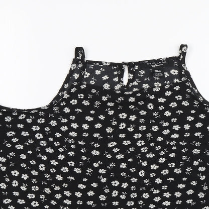 Close-up detail of New Look girls’ black floral basic blouse, size 14, years