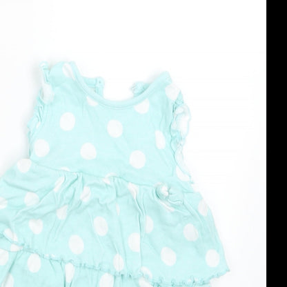 Close-up detail of George girls’ green polka dot basic t-shirt, size 9-12, months