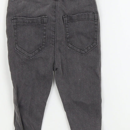 Brand and care label for Disney Baby boys’ grey cargo trousers, size 3-6, months