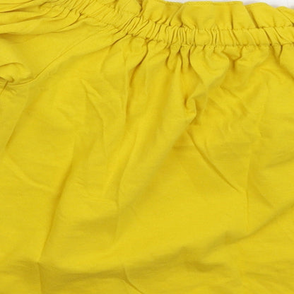 Brand and care label for Miss Selfridge women’s yellow basic t-shirt, size UK 8