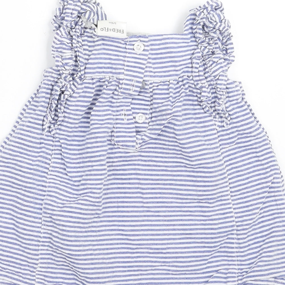 Brand and care label for F&F girls’ blue striped a-line, size 3-6, months