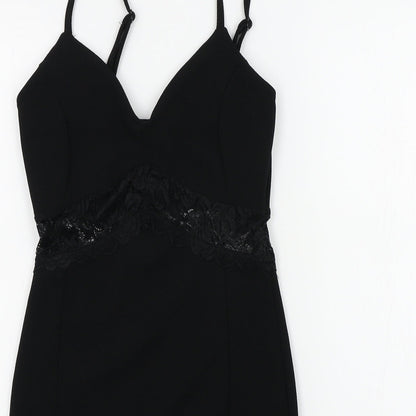 Close-up detail of Miss Selfridge women’s black a-line, size UK 4