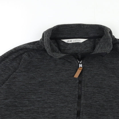Close-up detail of H&M girls’ grey fleece jacket, size 13, years