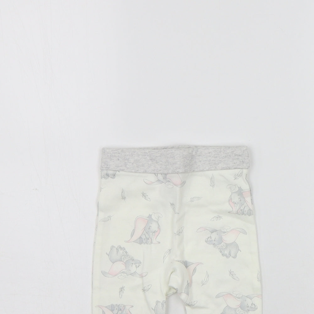 Close-up detail of Disney girls’ beige geometric jogger leggings, size 6-9, months - elastic waist band