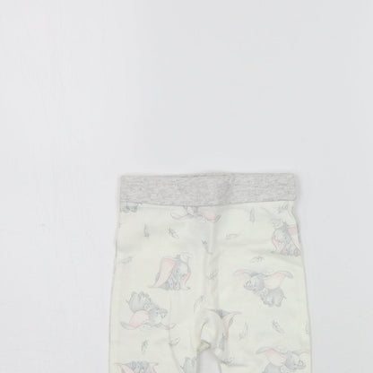 Close-up detail of Disney girls’ beige geometric jogger leggings, size 6-9, months - elastic waist band