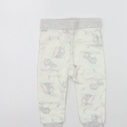 Brand and care label for Disney girls’ beige geometric jogger leggings, size 6-9, months - elastic waist band