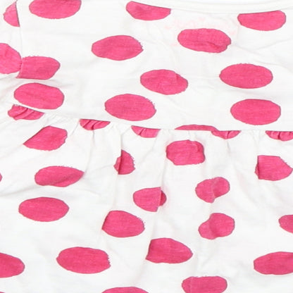 Brand and care label for Early Days girls’ white polka dot basic t-shirt, size 0-3, months