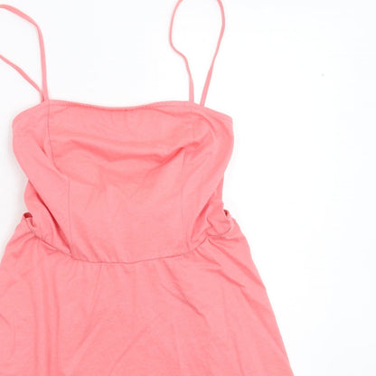Close-up detail of ASOS women’s pink mini, size UK 10