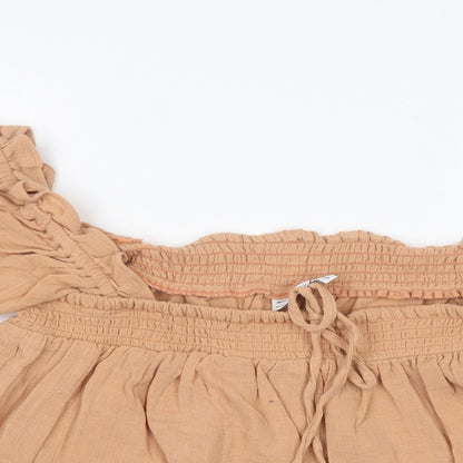 Close-up detail of ASOS women’s orange basic t-shirt, size UK 14, - cropped