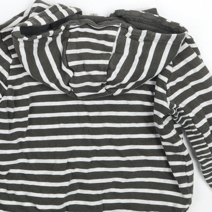 Brand and care label for Tu girls’ green striped jacket, size 2-3, years