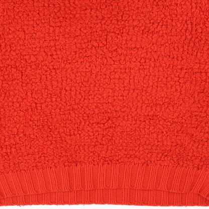 Brand and care label for Henry Holland women’s red jumper, size UK 12