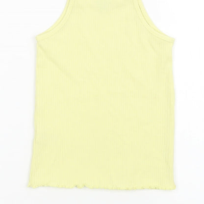 Brand and care label for TU girls’ yellow basic tank, size 5, years