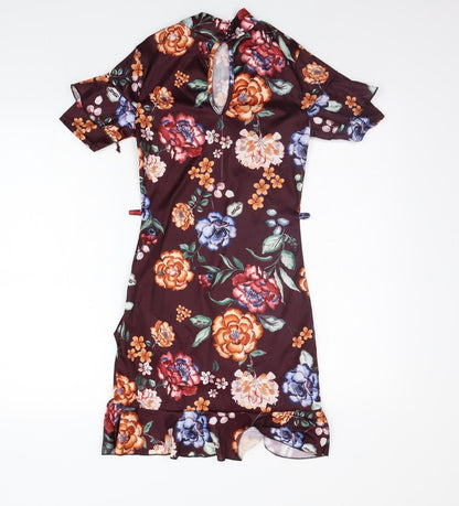 Back view of misguided women’s purple floral a-line, size UK 8