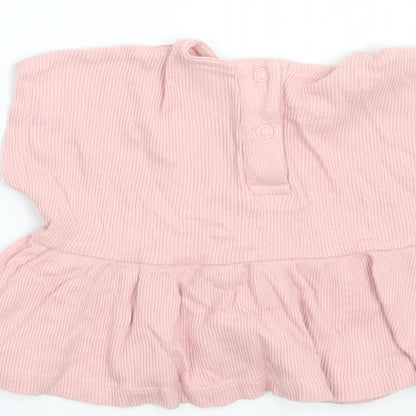 Brand and care label for George girls’ pink basic t-shirt size newborn