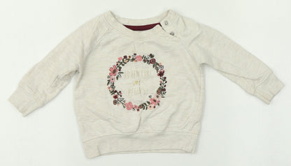 Front view of Primark girls’ beige jumper, size 6-9, months