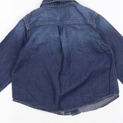 Brand and care label for Gap girls’ blue denim jacket, size 3, years