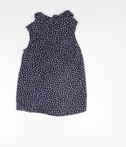Back view of Nutmeg girls’ blue polka dot basic button-up, size 10-11, years