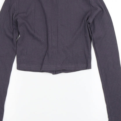 Brand and care label for Missguided women’s purple basic blouse, size UK 6