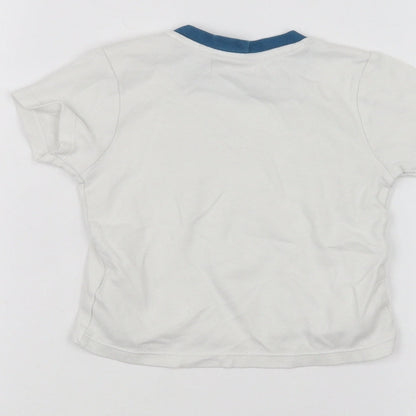 Brand and care label for Ladybird Baby White Basic T-Shirt, size 12-18, Months