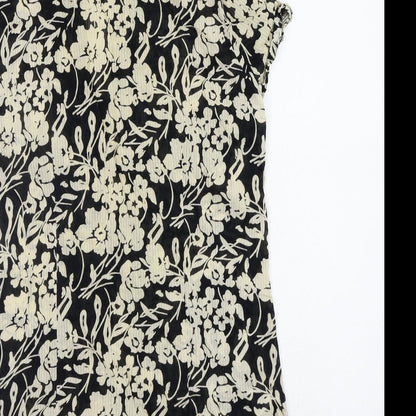 Brand and care label for Soon women’s black floral basic blouse, size UK 14