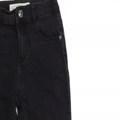Close-up detail of Denim & Co. girls’ blue denim skinny jeans, size 10-11, years