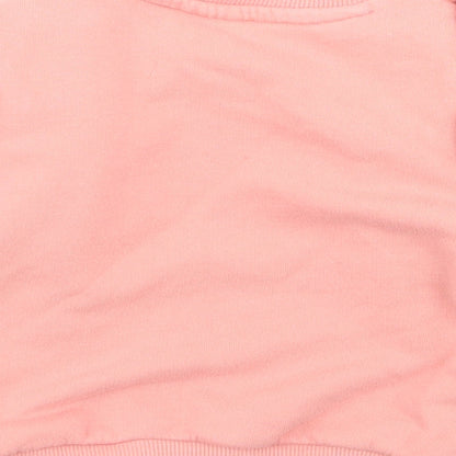 Brand and care label for F&F girls’ pink jumper, size 6-9, months