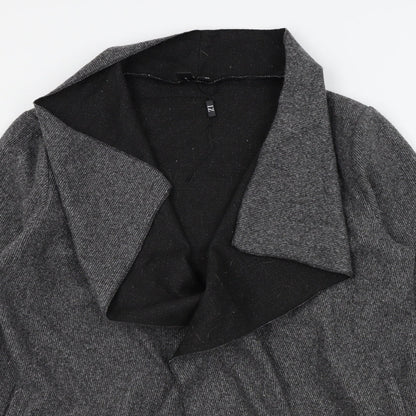 Close-up detail of izabel women’s green jacket, size UK 10