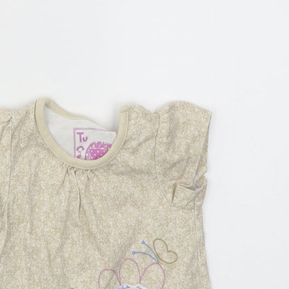 Close-up detail of Tu girls’ beige basic t-shirt, size 0-3, months