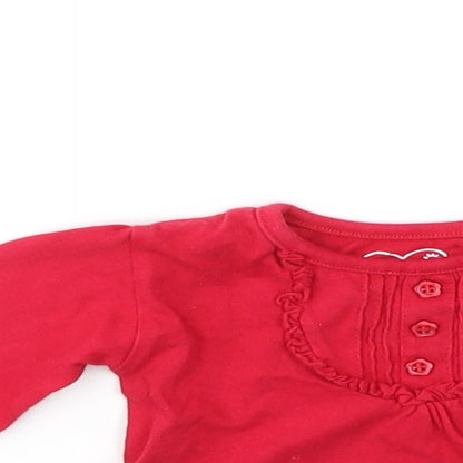 Close-up detail of Early Days girls’ red basic t-shirt, size 0-3, months