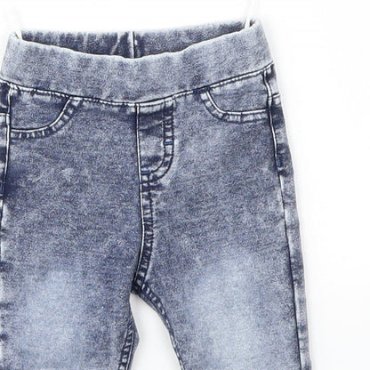 Close-up detail of H&M girls’ blue capri jeans, size 3-6, months