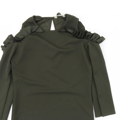 Close-up detail of Miss Selfridge women’s green mini, size UK 14