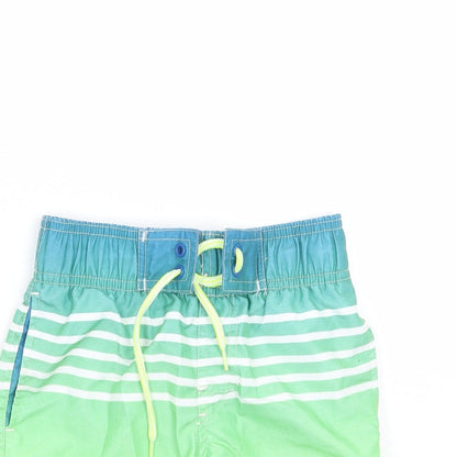 Close-up detail of Rebel boys’ green bermuda shorts, size 4-5, years