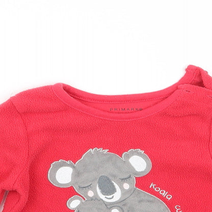 Close-up detail of Primark Baby Red jumper, size 6-9, Months