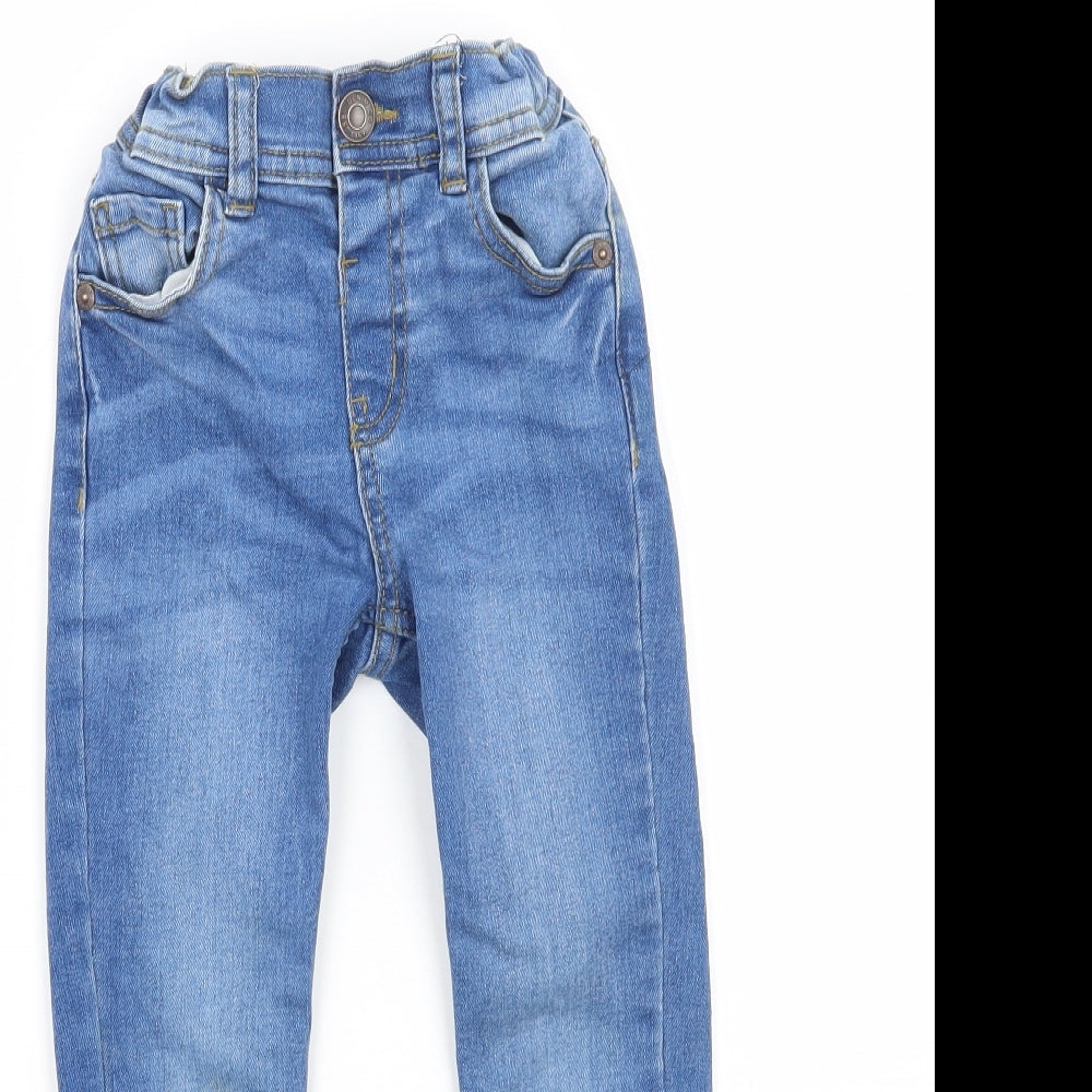 Close-up detail of Denim & Co. girls’ blue skinny jeans, size 4-5, years