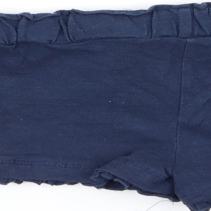 Brand and care label for F&F girls’ blue capri trousers, size 18-24, months - shorts