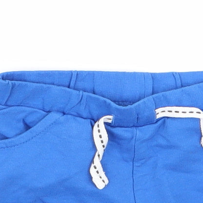 Close-up detail of miane boys’ blue capri trousers, size 0-3, months