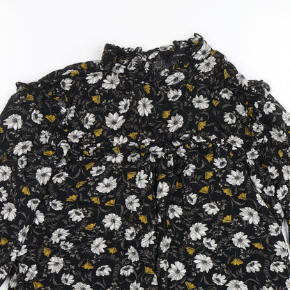 Close-up detail of Atmosphere women’s black floral basic blouse, size UK 8